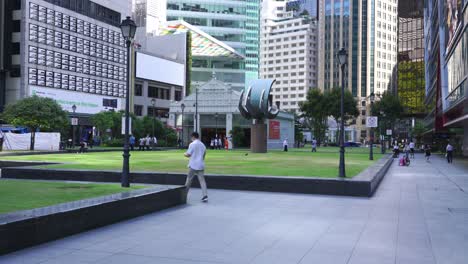 People-walk-at-CBD-Raffles-place-main-plaza