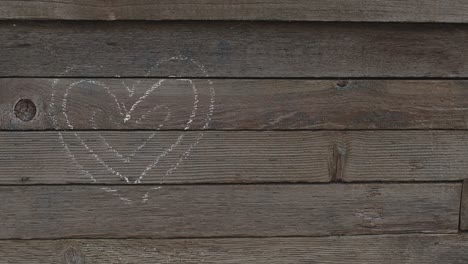 Heart-on-a-wooden-plank-wall
