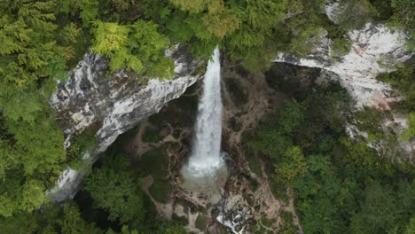 Reveal-of-Wildenstein-Waterfall-in-the-southern-Austrian-Alps-from-high-above,-Aerial-orbit-right-shot