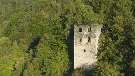 Aerial-view-of-the-beautiful-Castle-or-fort-ruins-on-the-mountain-and-its-surroundings