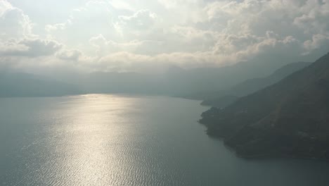 Drone-aerial,-landscape-panoramic-day-view-of-beautiful-lake-Atitlan,-Guatemala