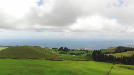 Agriculture-fields,-rural-landscape-with-Atlantic-Ocean-in-background,-Azores