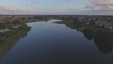 Flying-Forward-Over-The-Sirvinta-River-At-Evening