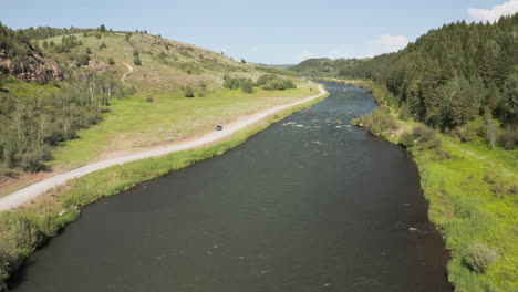 High-Fly-over-drone-footage-over-Henry's-Fork-river-in-southeastern-Idaho,-USA
