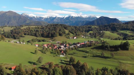 Ponikve-village-rural-Slovenia-Soca-valley-push-in-to-small-town-lush-green-aerial-view