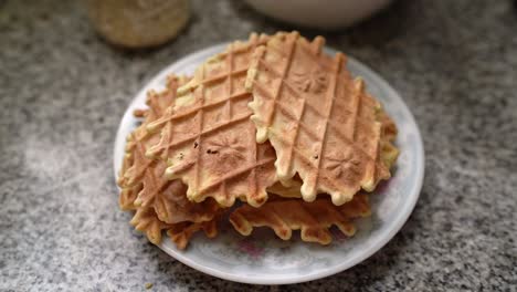 Plate-Of-Freshly-Cooked-Pizzelle-Waffle