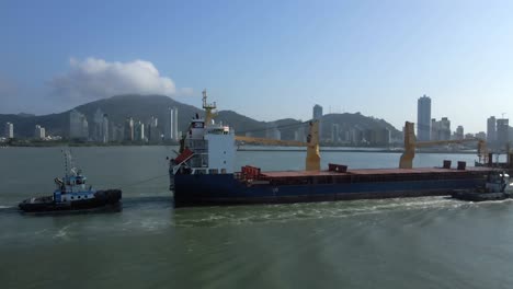 Cargo-Bulk-Carrier-Ship-Navigating-The-Ocean-Near-Santa-Catarina,-Southern-Brazil---drone-shot