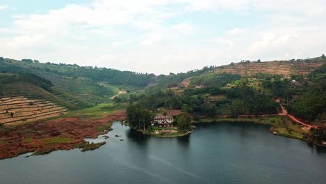 Idyllic-View-Of-Birdnest-Resort-With-Field-Terraces-At-Background-In-Kabale,-Lake-Bunyonyi,-Uganda