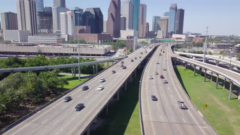 Establishing-drone-shot-of-Downtown-Houston-from-I10-and-I45-intersection
