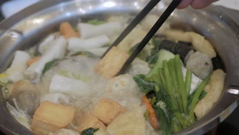 Thai-hot-pot-style-full-of-fish-ball,-vegetable,-meat,-pork-slide