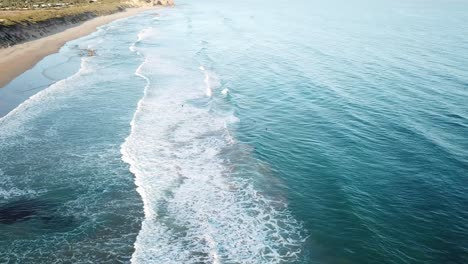 Drone-aerial-over-Anglesea-beach-with-blue-waves