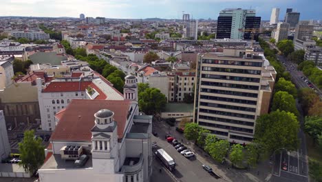 Elevated-railroad-becomes-a-subway-Great-aerial-view-flight-panorama-overview-drone
of-Nollendorf-Place-Berlin-Germany-at-summer-day-2022
