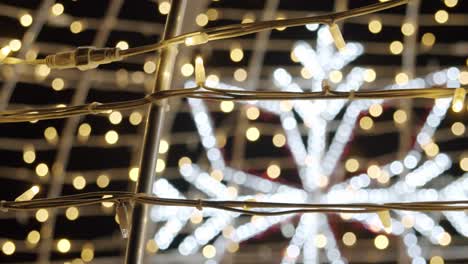 Christmas-Light-Decoration-At-Night-With-a-Large-Snowflake-Shape