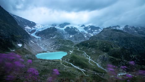 Day-to-night-time-lapse-of-Susten-Glacier-and-its-glacial-lake-as-seen-from-Sustenpass,-Switzerland