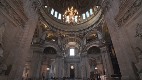 Pan-up-of-enormous-indoor-st-pauls-cathedral-London