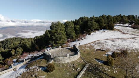 Circular-aerial-view-of-the-beautiful-Cap-del-Ras-viewpoint-on-the-top-of-the-mountains-in-La-Cerdanya