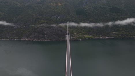 Areal-footage-of-a-suspension-bridge-over-a-fjord