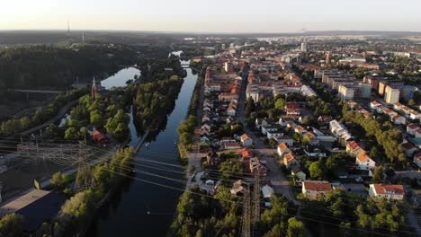 Aerial-over-Trollhättan-in-Sweden-with-perfect-sunset-sunlight