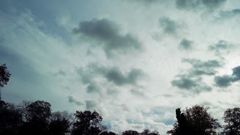 Low-and-heavy-clouds-passing-in-the-sky-on-a-timelapse