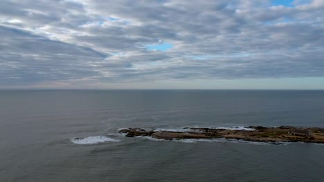 Drone-advancing-the-rock-on-the-ocean-shore-on-Uruguay