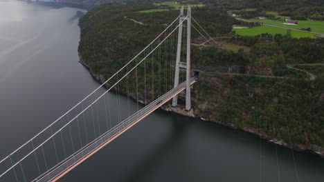 A-truck-driving-over-Hardanger-bridge---one-of-the-longest-suspension-bridges-in-the-world