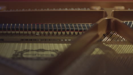Piano-keys-move-up-and-down-inside-a-piano