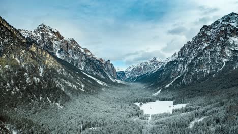 Flight-over-the-valley-to-Pederu,-in-Fannes-Sennes-natural-park-in-South-Tirol,-Dolomites