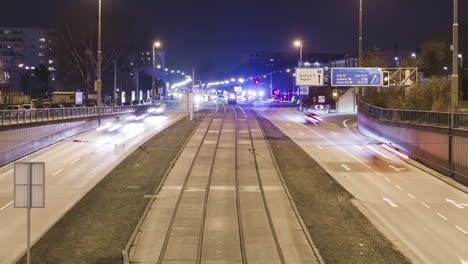 Timelapse-ZOOM-OUT-of-busy-underpass-in-Vienna,-Austria