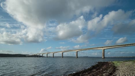 Dramatic-timelapse-of-clouds-over-the-Sallingsund-Bridge,-Roslev-Denmark