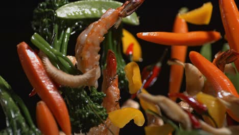 Vegetables-and-seafood-are-tossed-in-a-pan