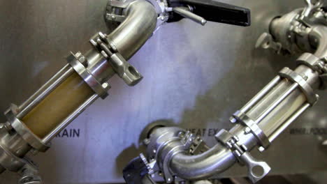 Close-up-shot-showing-Quality-Of-Wort-Filtration-and-color-during-Beer-Production-process