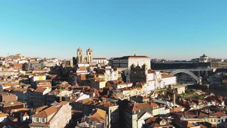 Fly-over-downtown-Porto-historical-buildings-on-sunny-day
