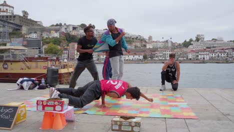 Entertainers-perform-on-the-streets-of-Porto,-Portugal,-breakdancing-and-comedy