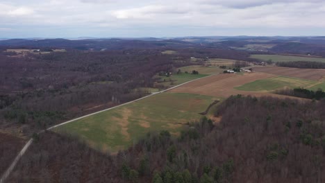 Aerial-View-Of-Vast-Field-Landscape-In-Rome,-Pennsylvania-In-Autumn---drone-shot