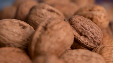 Close-up-view-of-macro-shot-walnuts-with-shell-on-the-table