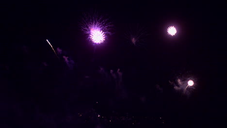 Multiple-colorful-fireworks-burst-in-midair.