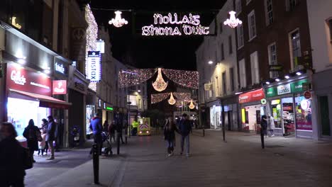 Still-shot-of-a-Dublin-street-at-Chrismas-time-in-hard-times-with-some-people-on-a-not-so-busy-street