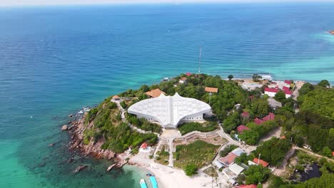 Aerial-4k-drone-footage-of-a-manta-ray-shaped-building-on-the-coastline-of-the-seashore-city-of-Pattaya-in-eastern-side-of-the-Gulf-of-Thailand