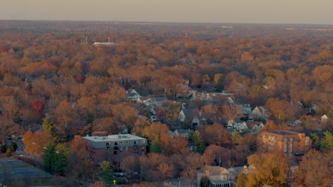 Aerial-flyover-charming-houses-in-a-nice-neighborhood-in-Autumn-at-peak-color
