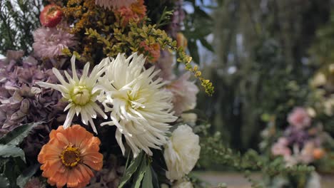 boho-chic-rustic-wedding-decoration-with-flowers,-dolly-slow-motion-closeup