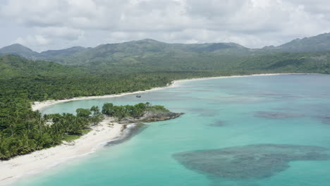 AERIAL---White-sand-beaches,-Playa-Rincon-beach,-Dominican-Republic,-circle-pan
