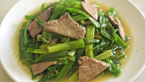 Stir-fried-onion-flower-stem-with-pork-liver---Asian-food-style