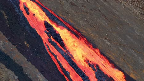Lava-Flowing-From-Fagradalsfjall-Volcano-In-Iceland-During-Eruption---drone-shot