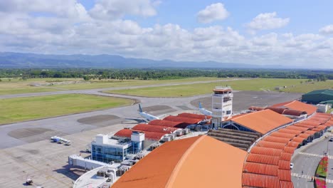 Aerial-Drone-Shot-Of-Cibao-International-Airport,-Also-Known-As-Santiago-Airport,-In-Santiago-de-los-Caballeros-Dominican-Republic