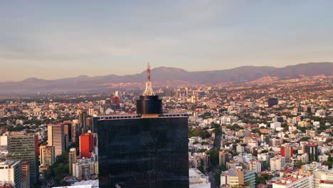 Aerial-Flying-World-Trade-Center-in-Mexico-City-cityscape-at-day