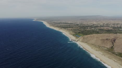 Drone-aerial-of-the-city-Playa-Todos-Santos-in-Baja,-Mexico