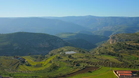 View-of-agricultural-fields-from-an-altitude-of-1000m-over-the-mountainous-terrain-in-the-province-of-Castellon-in-Spain