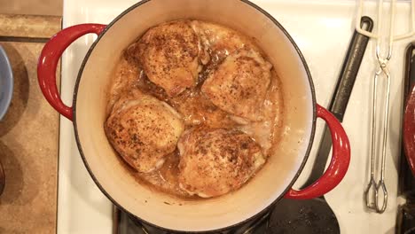 Overhead-view-of-free-range-chicken-thighs-roasting-in-hot-oil-in-the-Dutch-oven---POT-ROASTED-CHICKEN-SERIES