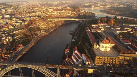 Porto-aerial-view-of-Portugal-main-city-with-skyline-at-sunset-Dom-luis-bridge-over-the-Douro-river