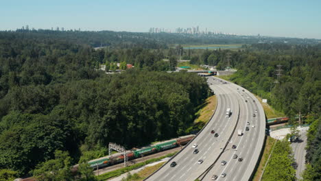 Aerial-view-flying-over-the-Trans-Canada-Highway-through-Burnaby,-Greater-Vancouver,-British-Columbia